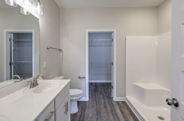 21 Bartow Street Decherd, TN 37324 - Photo 26 of 30 a bathroom with a sink a toilet and shower