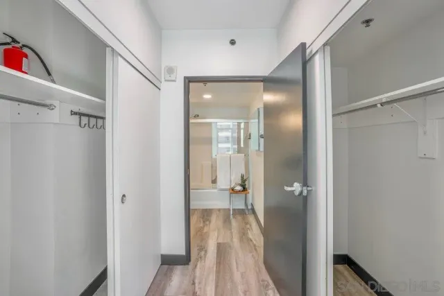 a view of a bathroom with a glass door shower