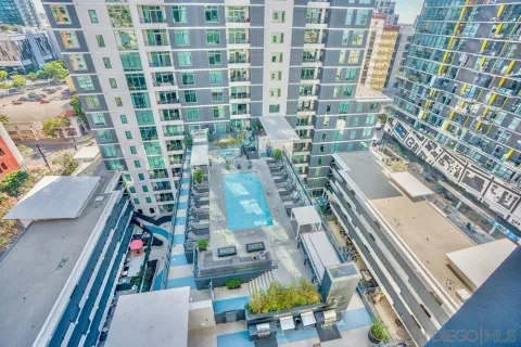 a view of a large building from a balcony