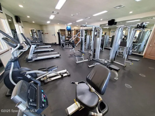 a picture of a room with a white wall and door