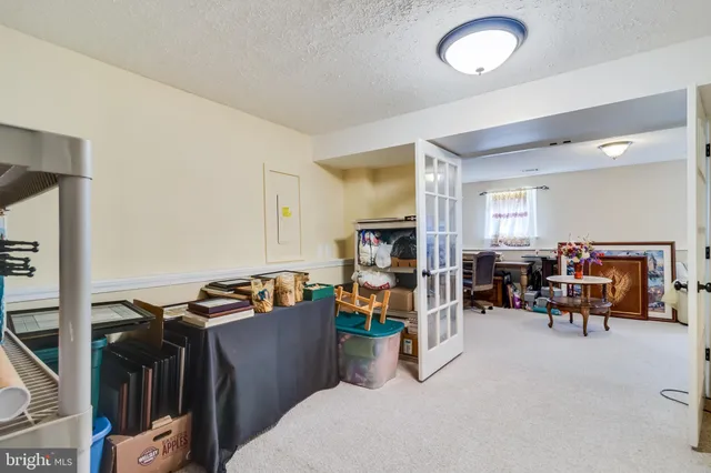 a view of a livingroom with furniture and