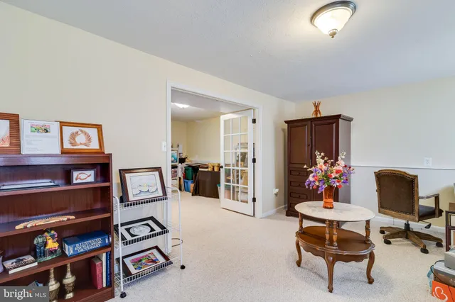 a view of a workspace with furniture