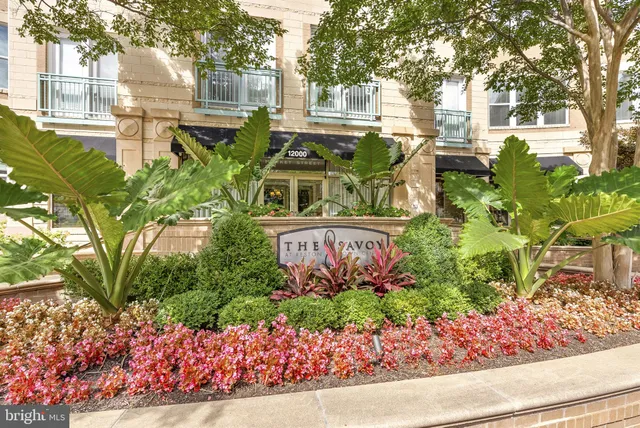 a view of a hallway with a chandelier