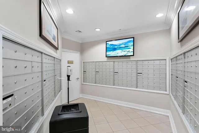 a living room with furniture and white walls