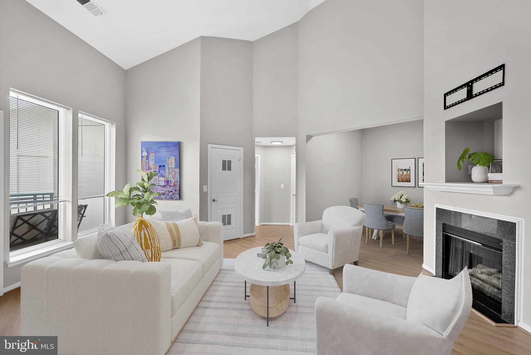 12000 Market Street, Unit 457 Reston, VA 20190 - Photo 9 of 59 living room virtually staged