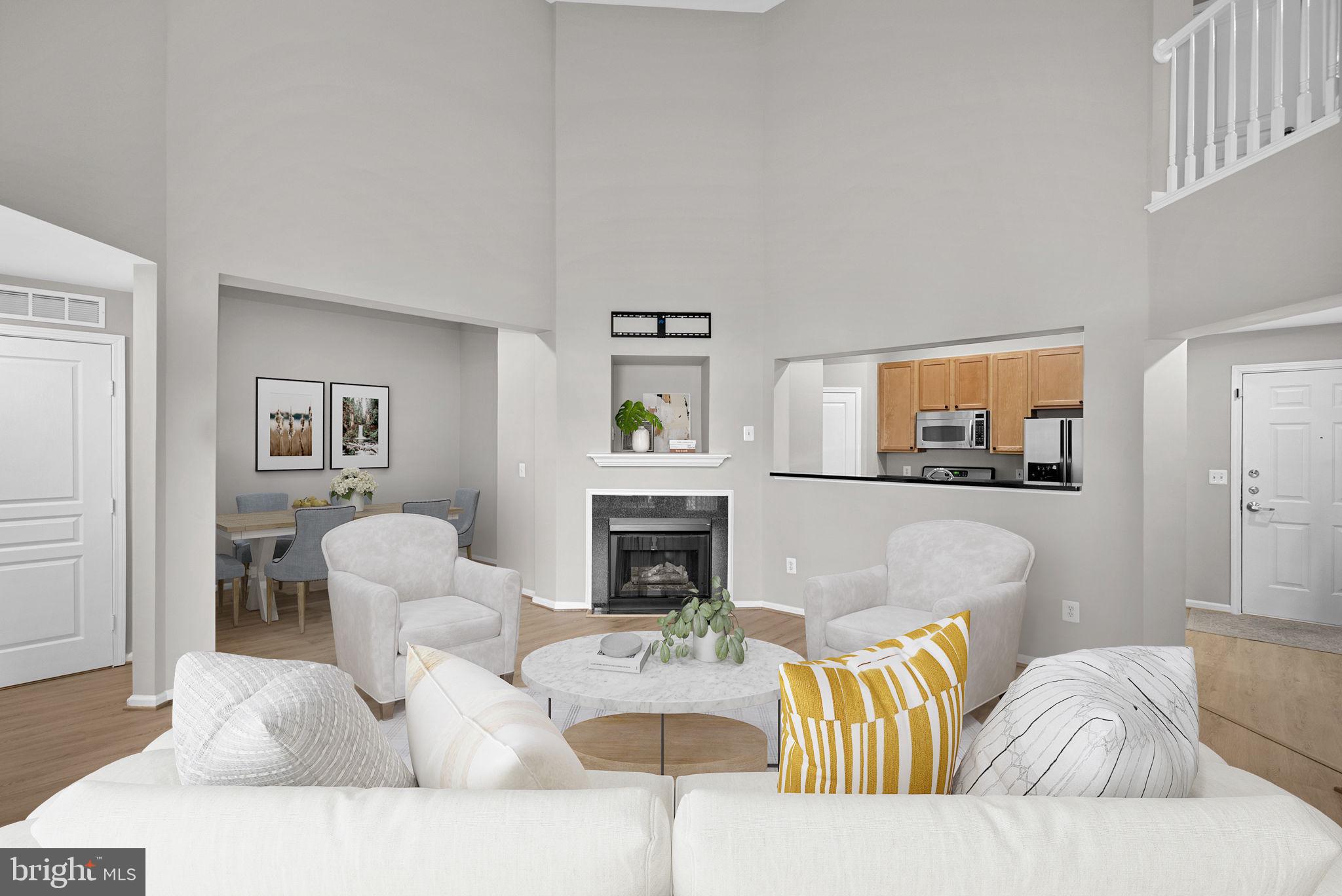 12000 Market Street, Unit 457 Reston, VA 20190 - Photo 10 of 59 living room virtually staged