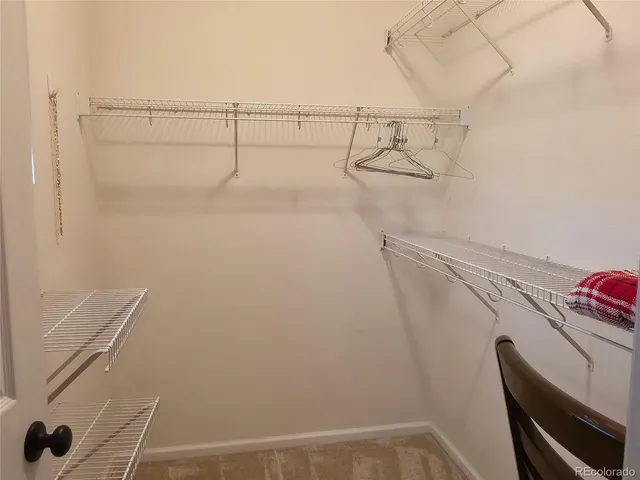 a view of small space with racks on the wall