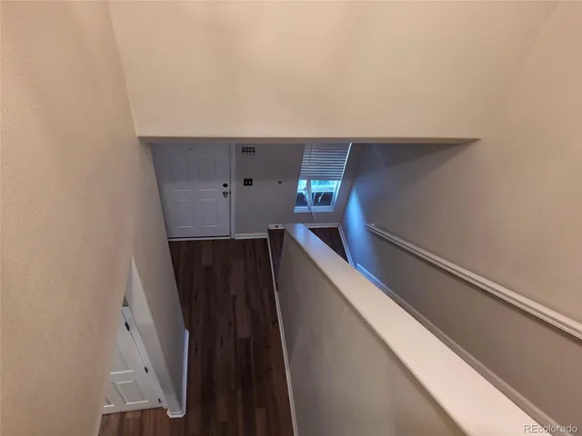 a view of balcony with furniture