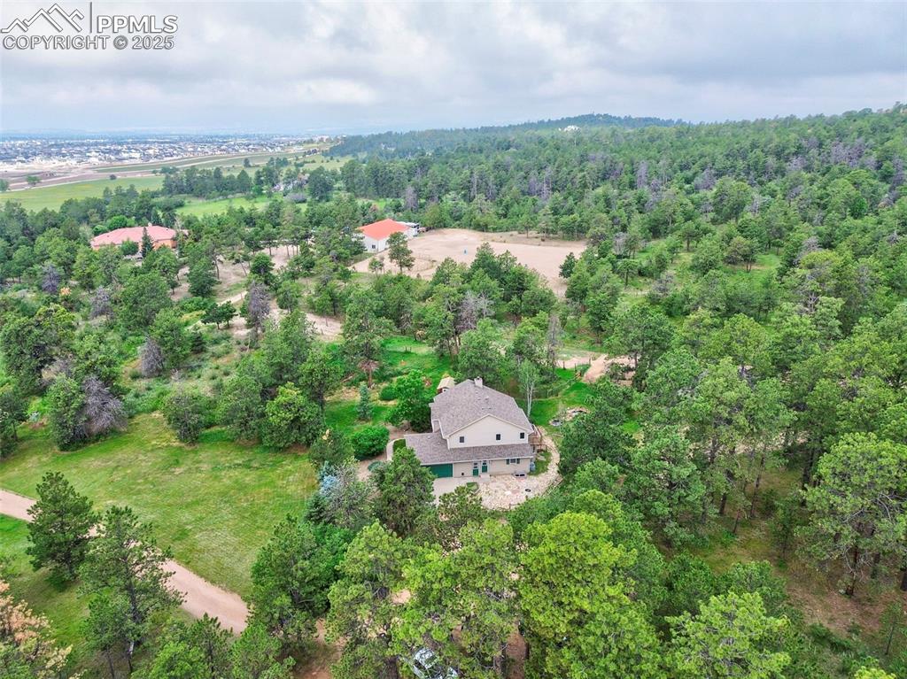 6290 Old Ranch Road Colorado Springs, CO 80908 - Photo 15 of 48 an aerial view of residential house with outdoor space and trees all around
