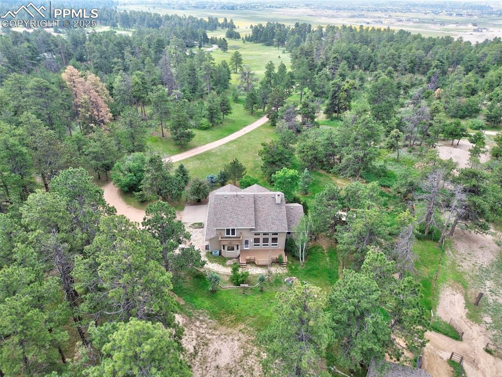 6290 Old Ranch Road Colorado Springs, CO 80908 - Photo 17 of 48 an aerial view of a house with a garden