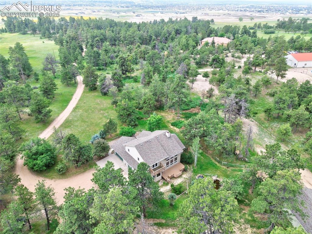 6290 Old Ranch Road Colorado Springs, CO 80908 - Photo 18 of 48 an aerial view of a house with a yard and lake view