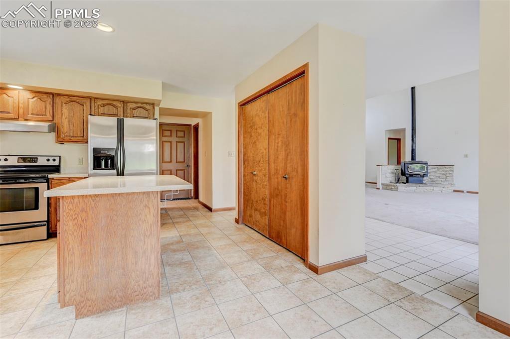6290 Old Ranch Road Colorado Springs, CO 80908 - Photo 23 of 48 a view of a kitchen with furniture and a kitchen