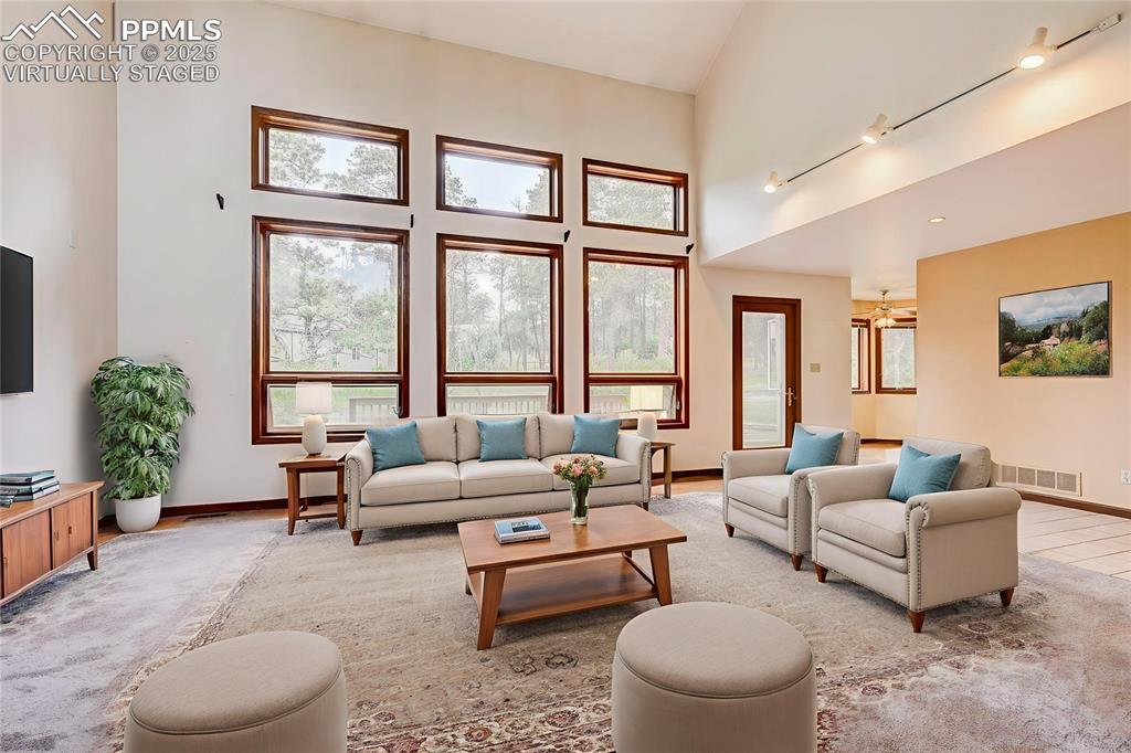 6290 Old Ranch Road Colorado Springs, CO 80908 - Photo 30 of 48 a living room with furniture and a large window