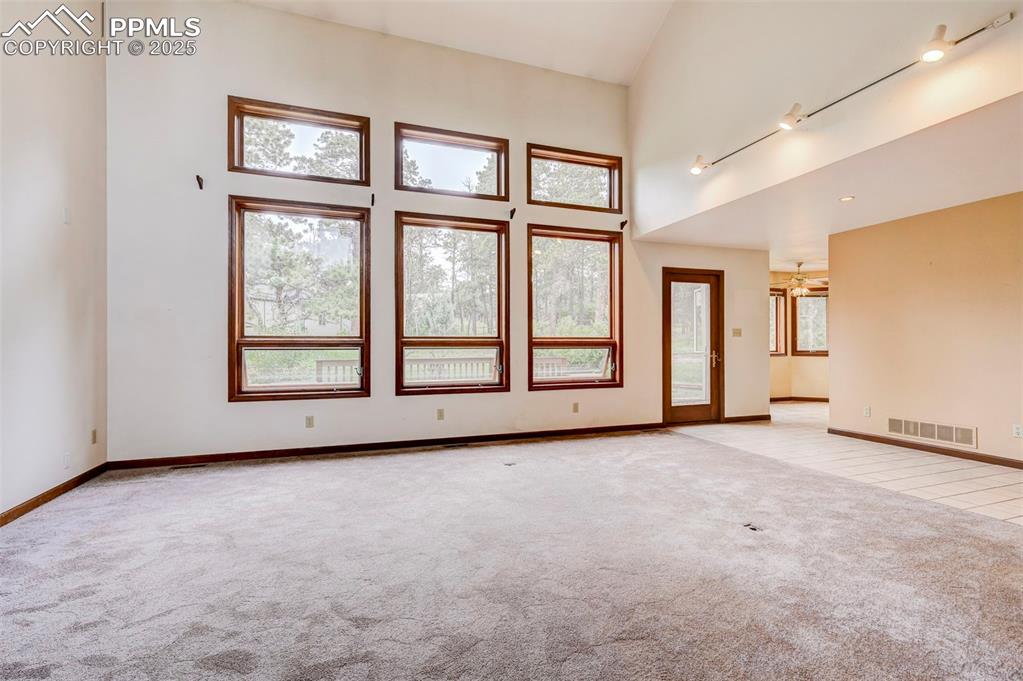 6290 Old Ranch Road Colorado Springs, CO 80908 - Photo 31 of 48 an empty room with windows