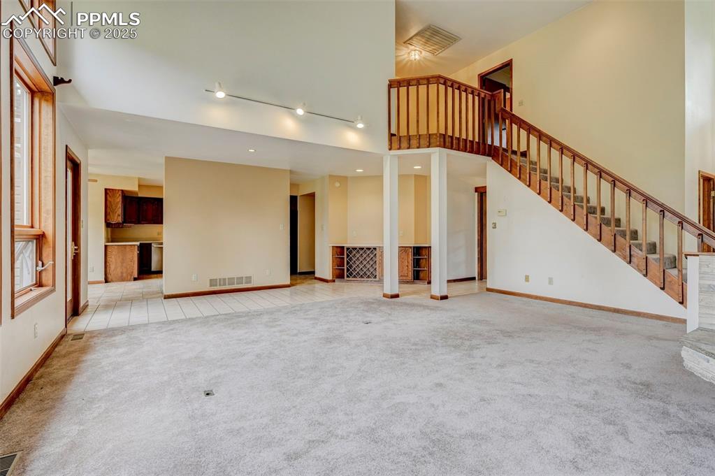 6290 Old Ranch Road Colorado Springs, CO 80908 - Photo 32 of 48 a view of an empty room with wooden floor