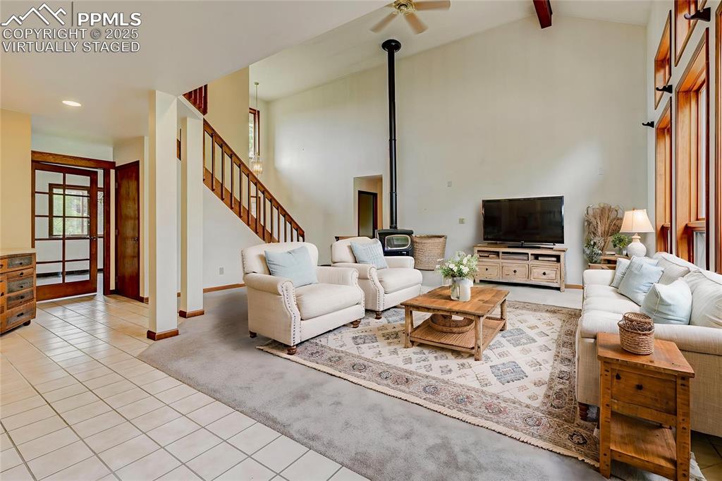 6290 Old Ranch Road Colorado Springs, CO 80908 - Photo 33 of 48 a living room with furniture and a flat screen tv