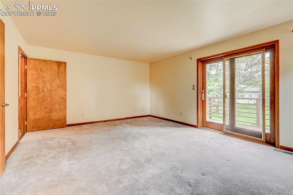 6290 Old Ranch Road Colorado Springs, CO 80908 - Photo 47 of 48 an empty room with windows
