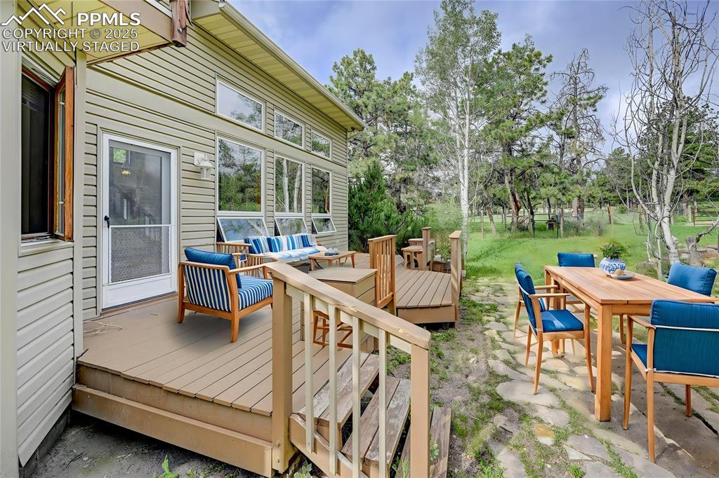 6290 Old Ranch Road Colorado Springs, CO 80908 - Photo 6 of 48 a view of a patio with table and chairs