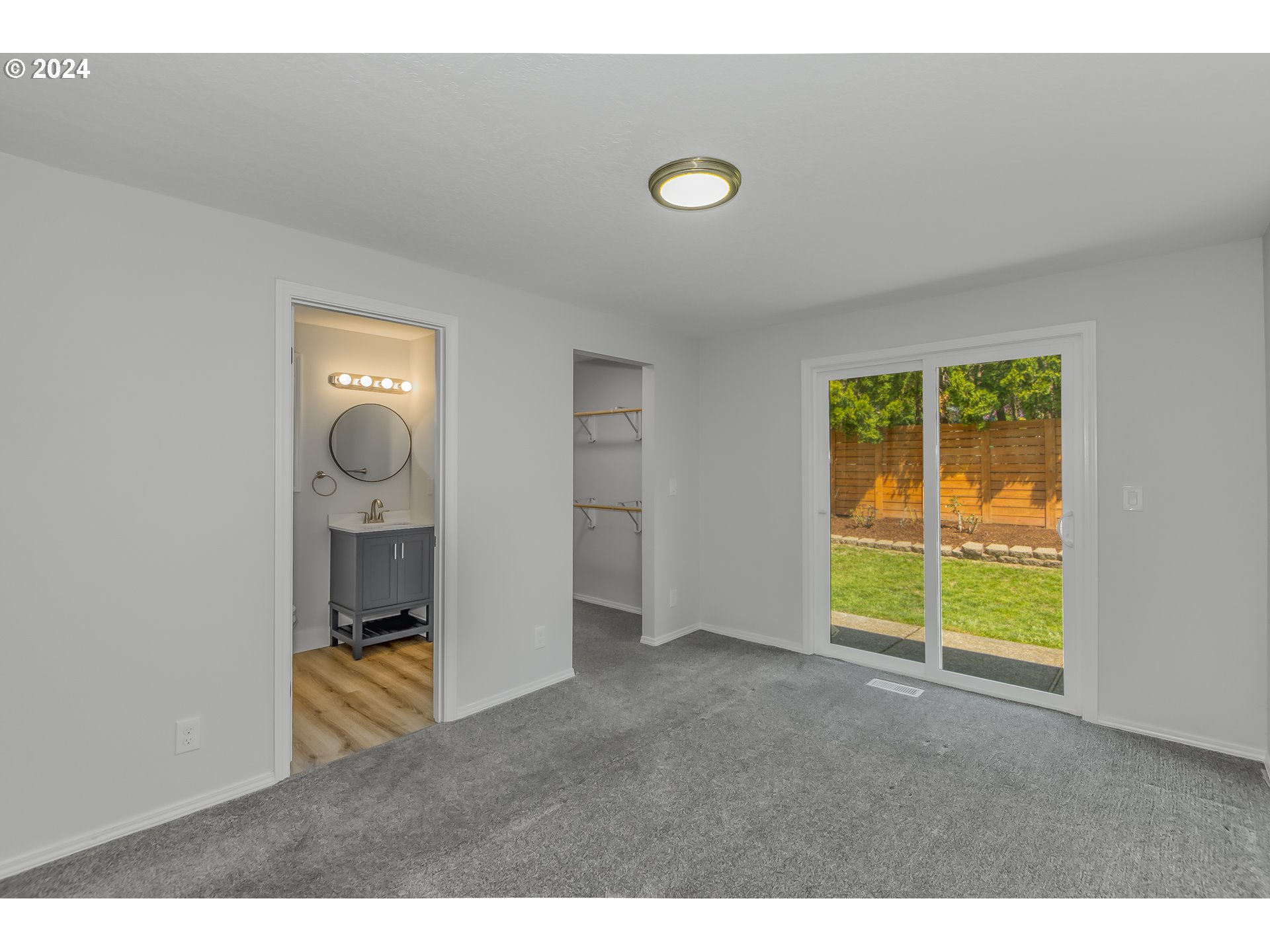 8640 Southwest 133rd Avenue Beaverton, OR 97008 - Photo 19 of 25 a view of a livingroom with wooden floor and a window