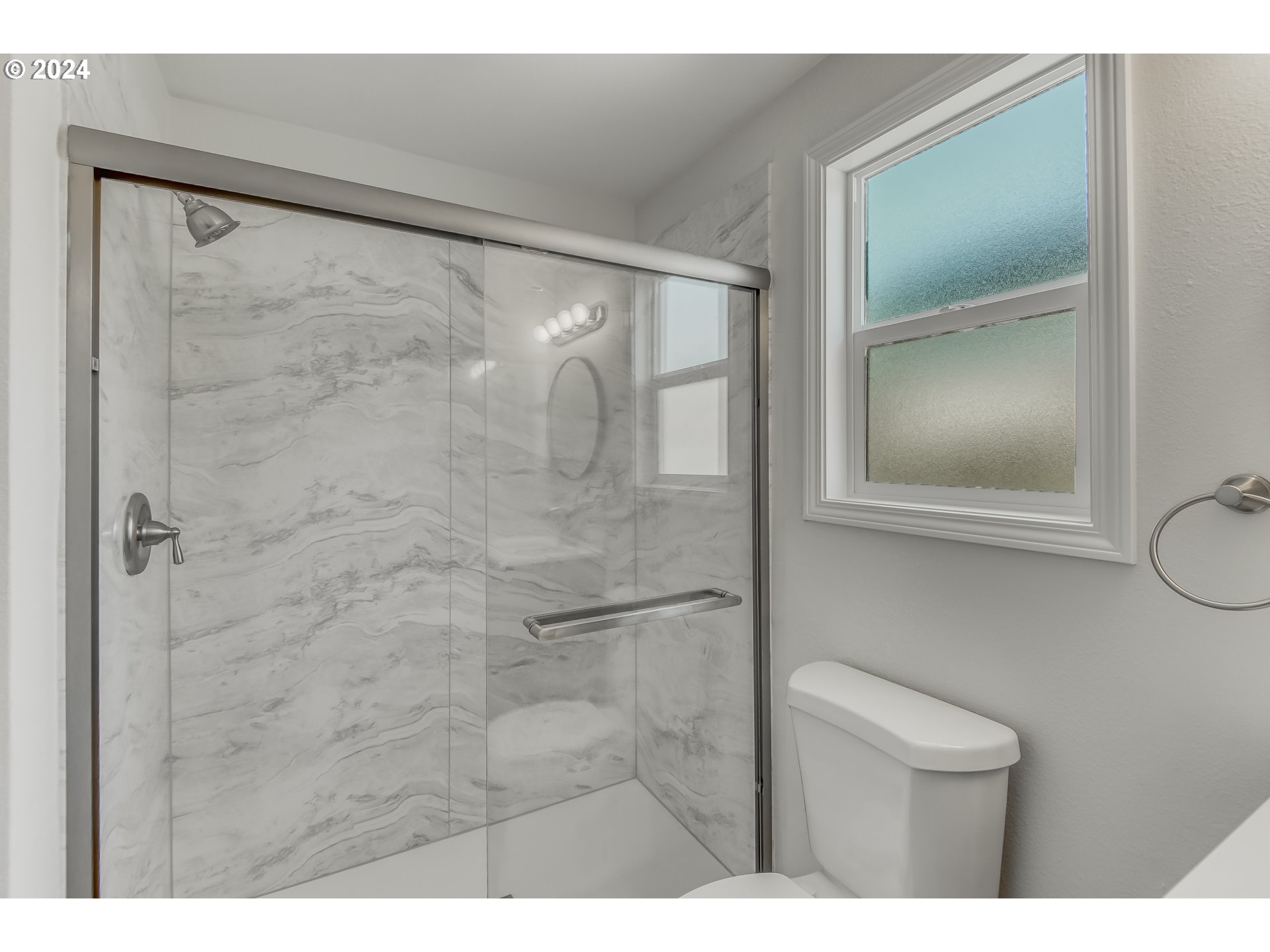 8640 Southwest 133rd Avenue Beaverton, OR 97008 - Photo 22 of 25 a bathroom with a shower