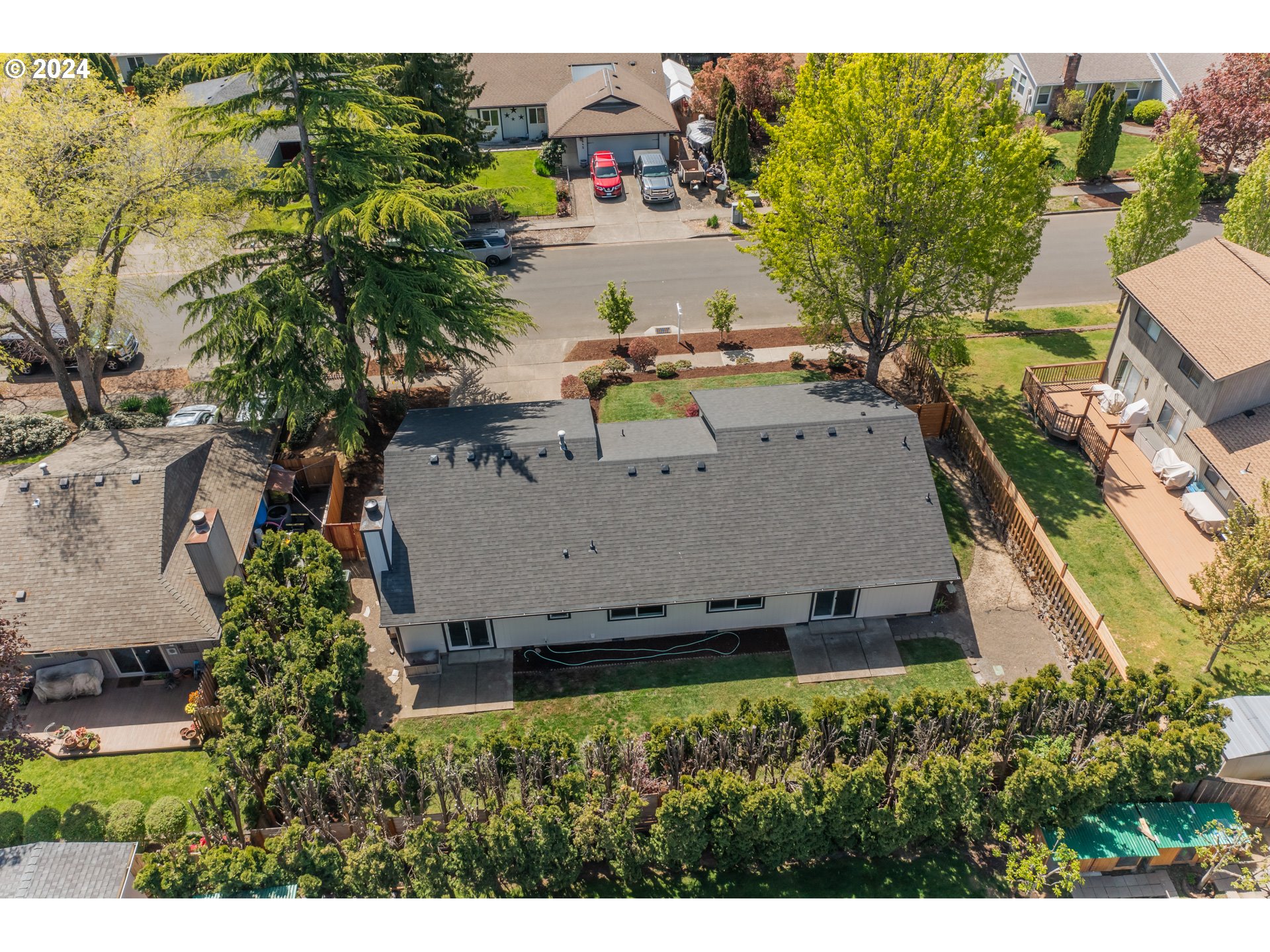 8640 Southwest 133rd Avenue Beaverton, OR 97008 - Photo 24 of 25 an aerial view of a house with a yard basket ball court and outdoor seating