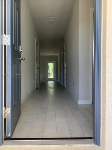 a kitchen with a stove and a microwave