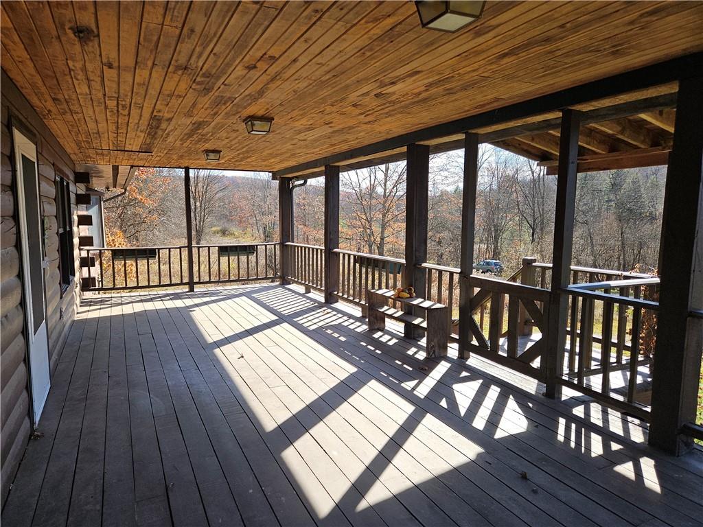 734 Torpedo Road Pittsfield, PA 16340 - Photo 4 of 33 a view of a patio with wooden floor