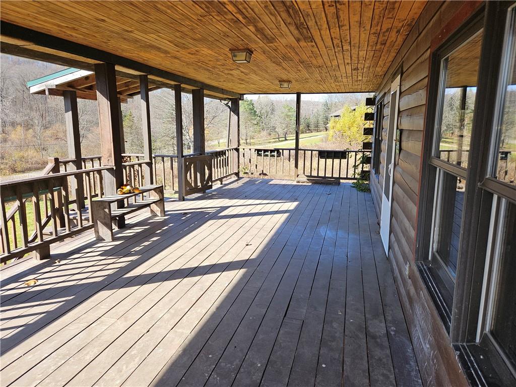 734 Torpedo Road Pittsfield, PA 16340 - Photo 6 of 33 a view of balcony with wooden floor