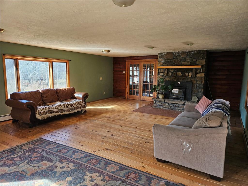 734 Torpedo Road Pittsfield, PA 16340 - Photo 8 of 33 a living room with furniture and window