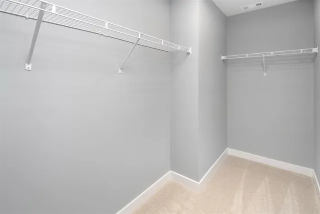 a view of a room with racks on the wall