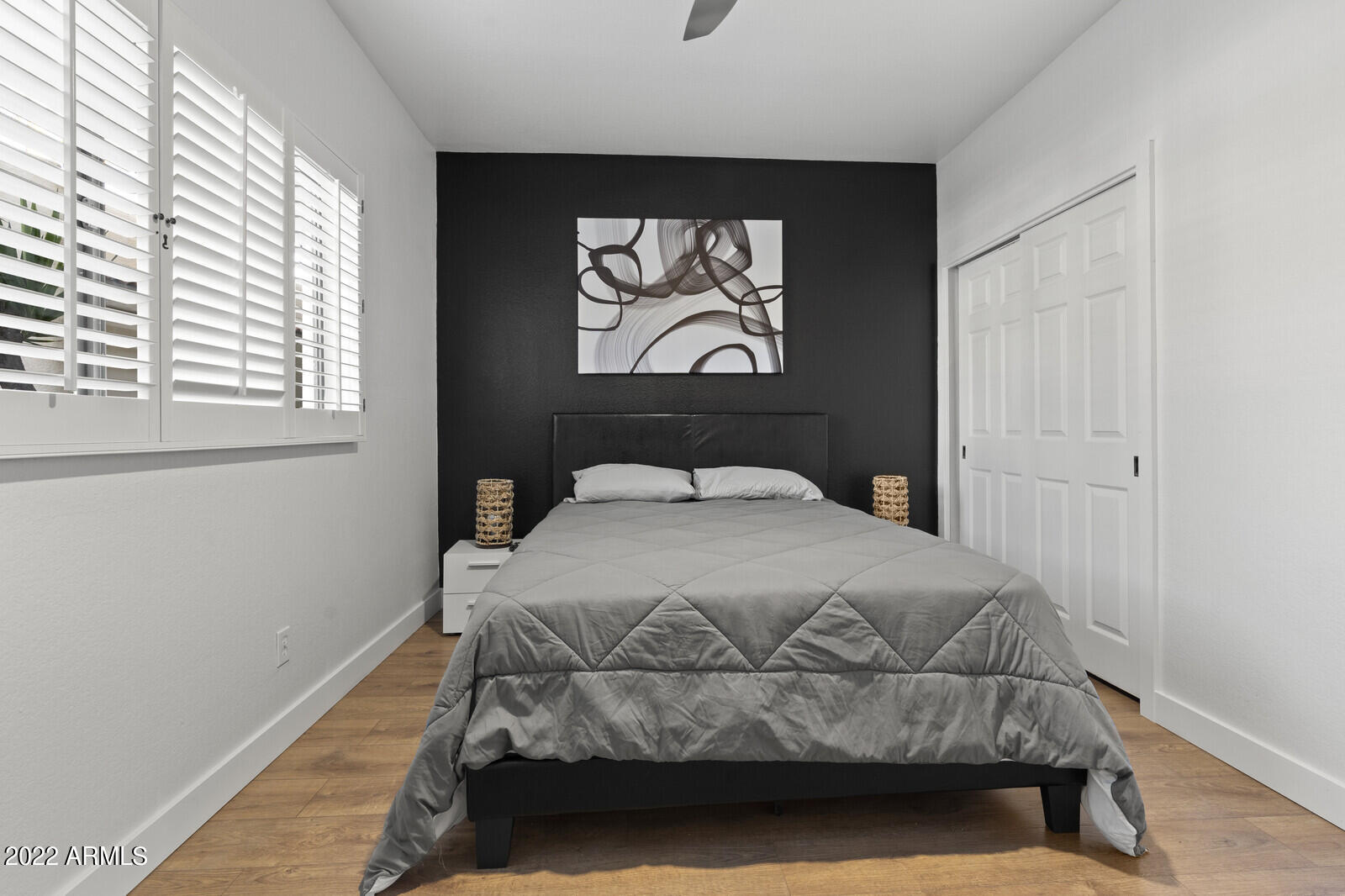 3047 East Rose Lane Phoenix, AZ 85016 - Photo 16 of 27 a bedroom with a bed and a window