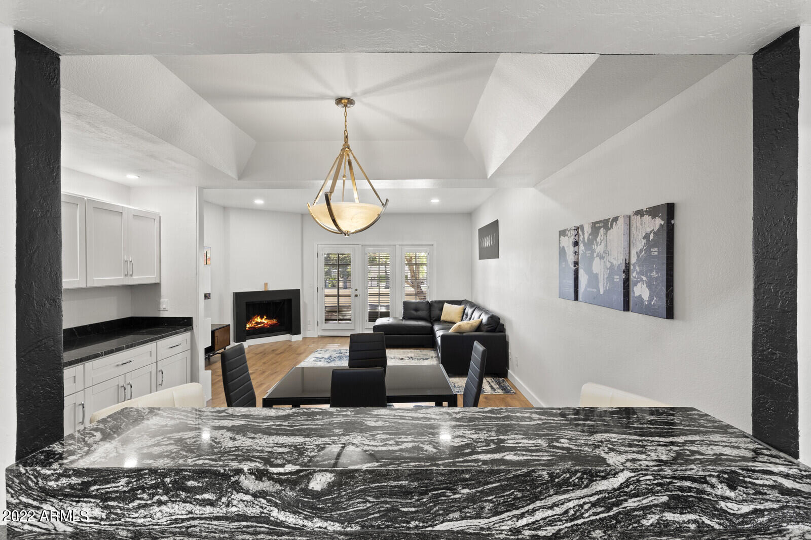 3047 East Rose Lane Phoenix, AZ 85016 - Photo 9 of 27 a living room with fireplace furniture and a flat screen tv