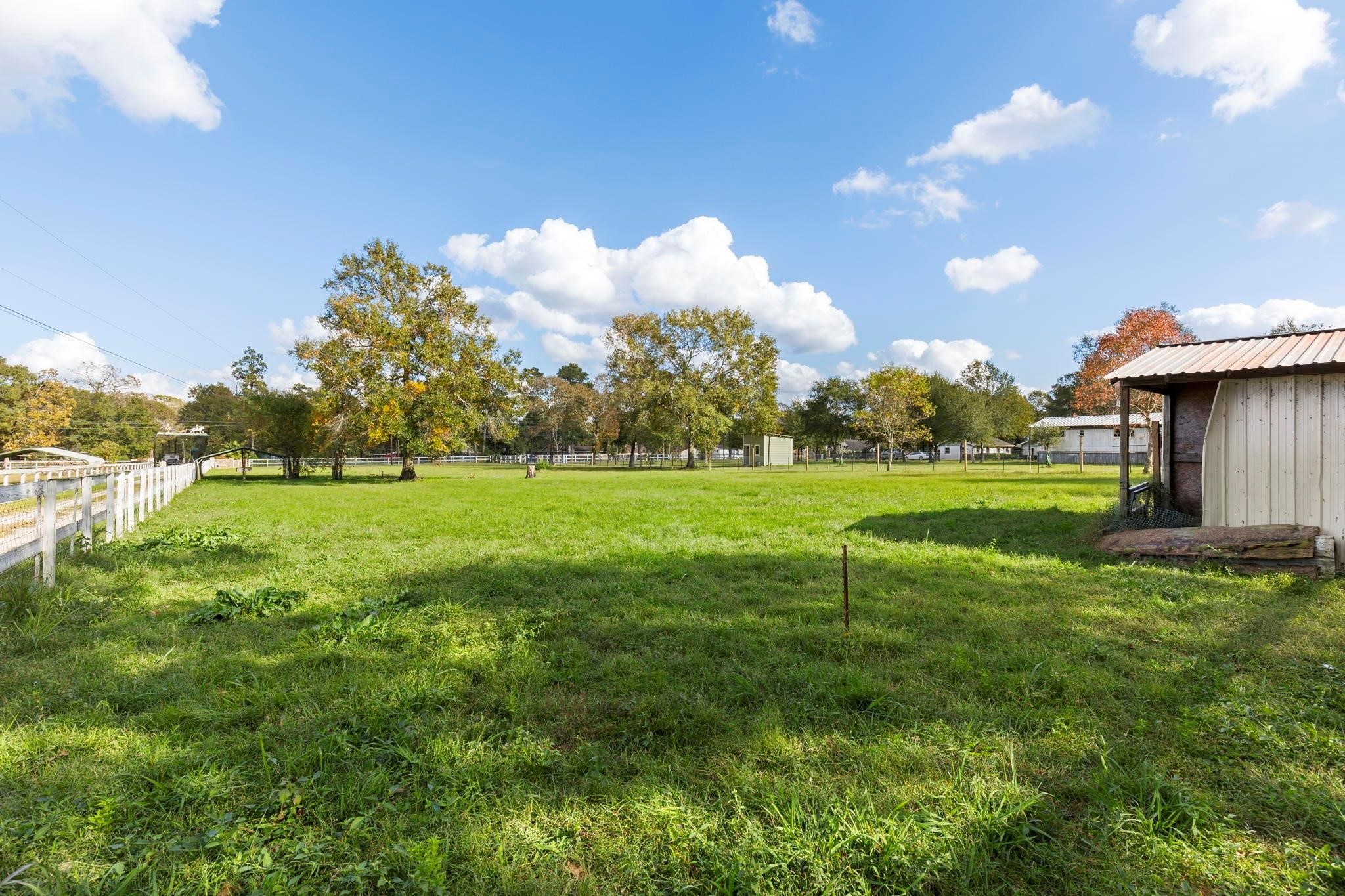 1155 Whipporwill Road Conroe, TX 77303 - Photo 11 of 34 Another Pasture with Storage Shed