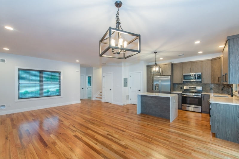 360 Orange Road, Unit 4 Montclair, NJ 07042 - Photo 35 of 37 a view of a kitchen with stainless steel appliances granite countertop a refrigerator a stove top oven a sink dishwasher and wooden floor