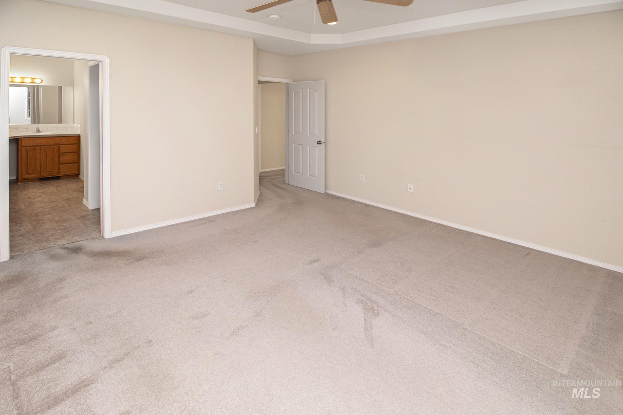 2133 13th Street Lewiston, ID 83501 - Photo 15 of 38 Spacious interior featuring neutral wall tones and light-colored carpet