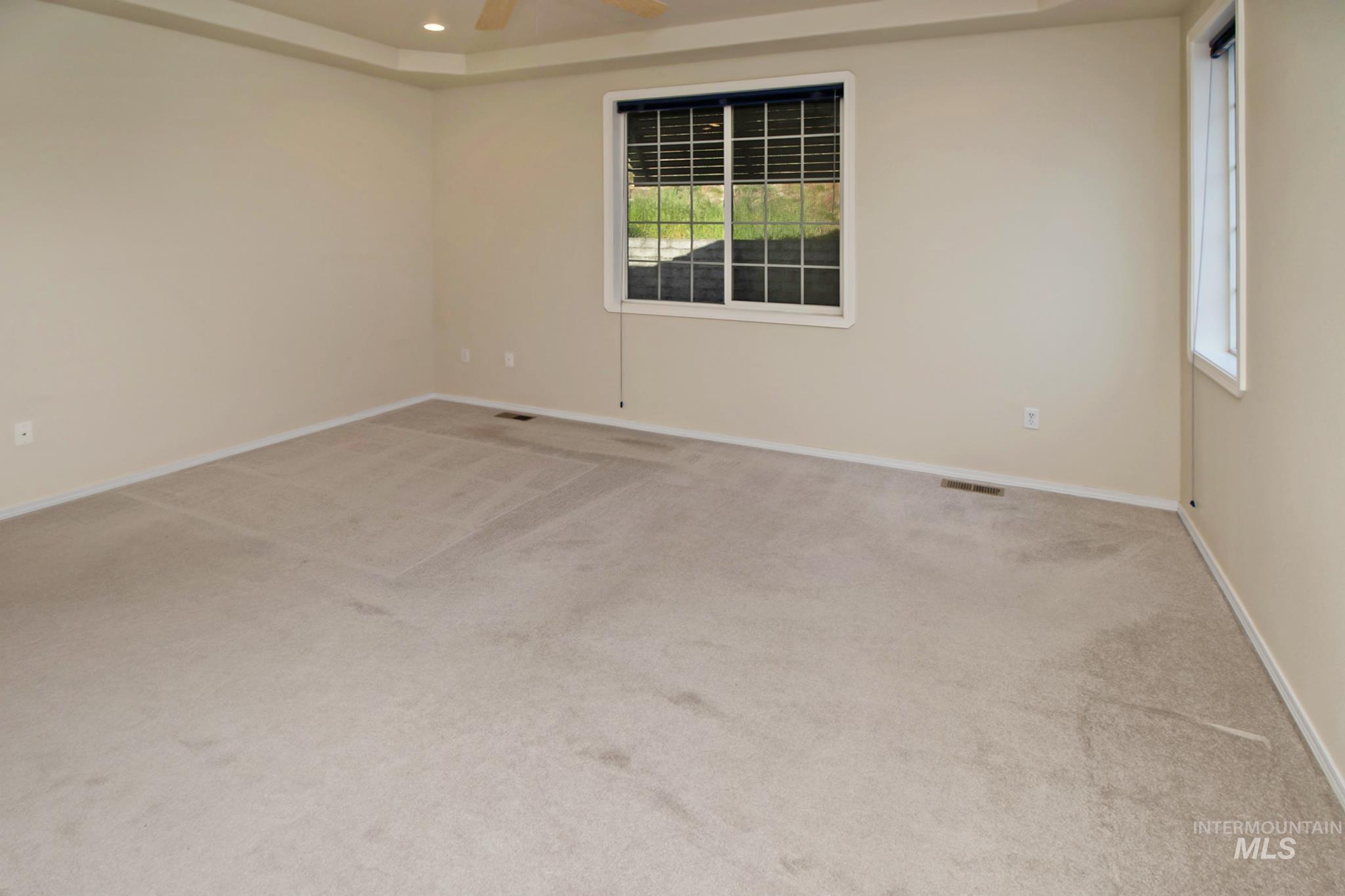 2133 13th Street Lewiston, ID 83501 - Photo 16 of 38 Spacious room featuring light-colored carpeting and neutral wall tones