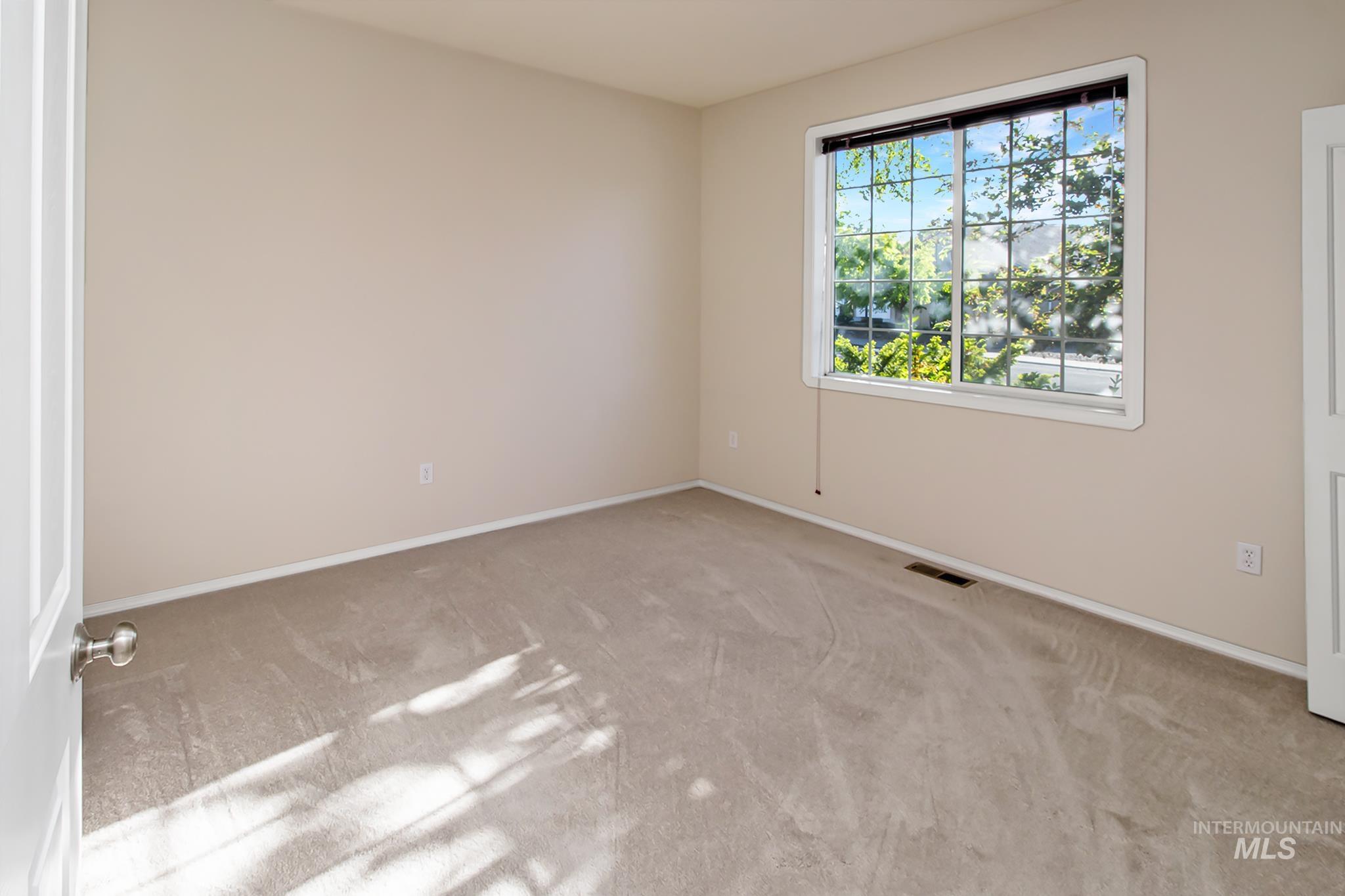 2133 13th Street Lewiston, ID 83501 - Photo 21 of 38 Neutral-toned wall paint and carpeting throughout the space