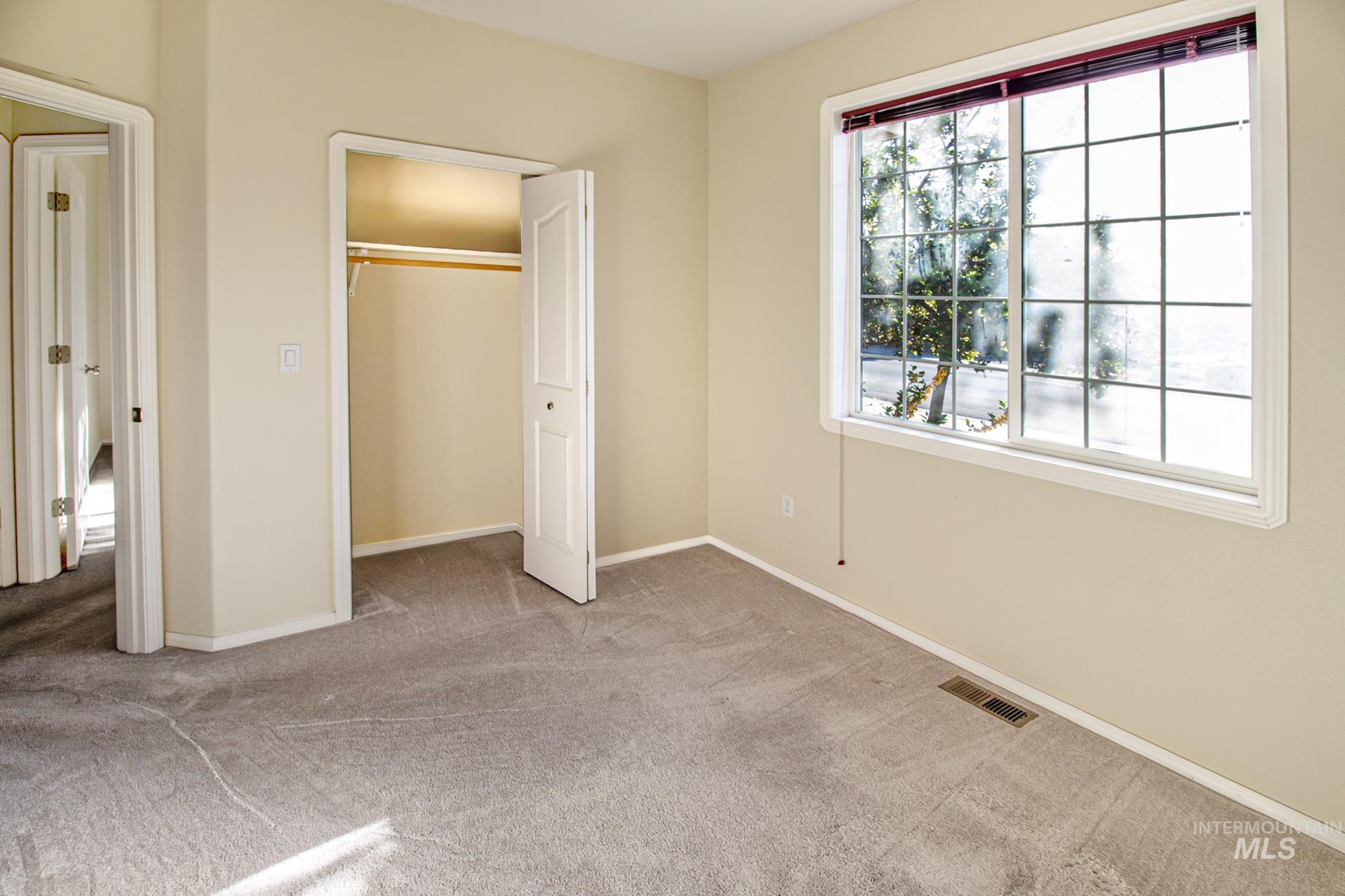 2133 13th Street Lewiston, ID 83501 - Photo 23 of 38 Room with neutral wall paint and grey carpeting