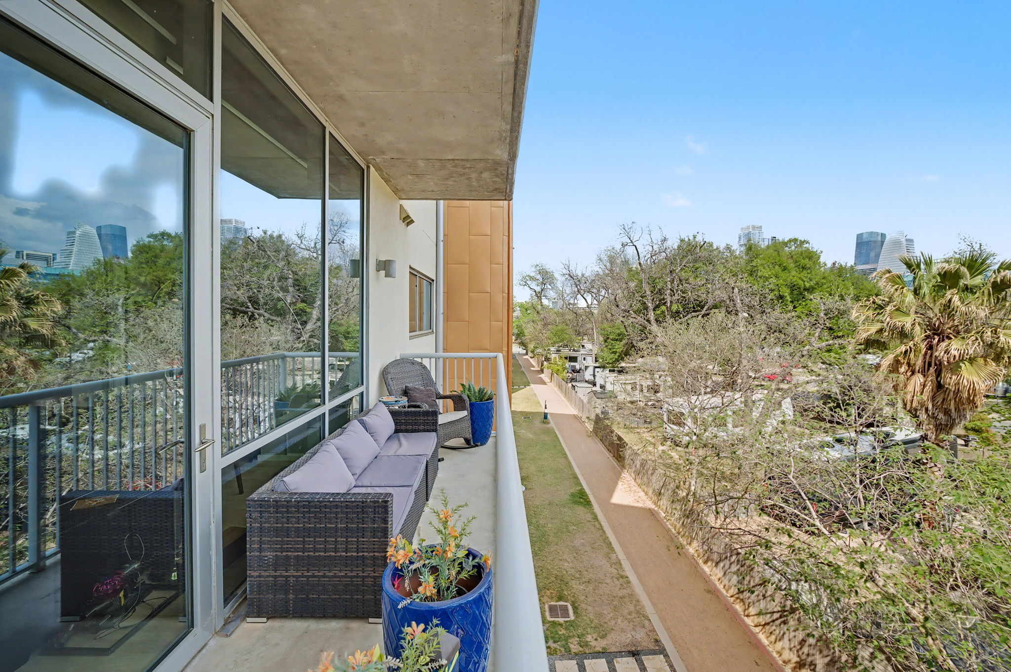 1600 Barton Springs Road, Unit 4305 Austin, TX 78704 - Photo 19 of 26 a balcony with chairs