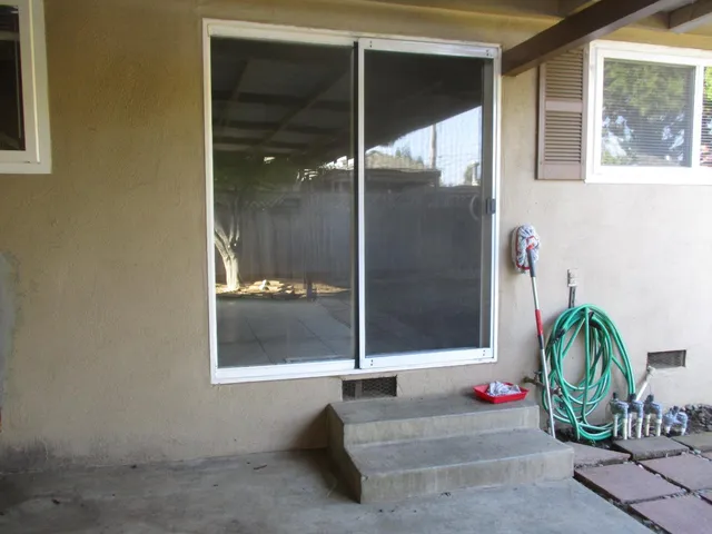 a bathroom with a tub and shower