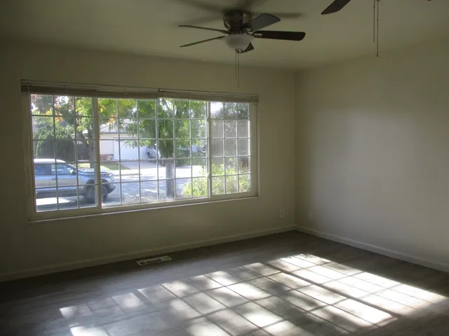 a view of an empty room and window