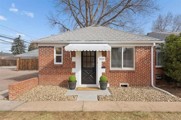 a front view of a house with a garage