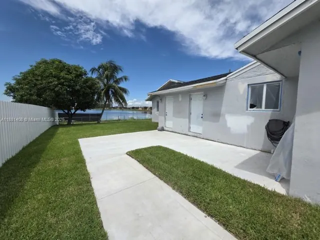 a view of a backyard with a garden