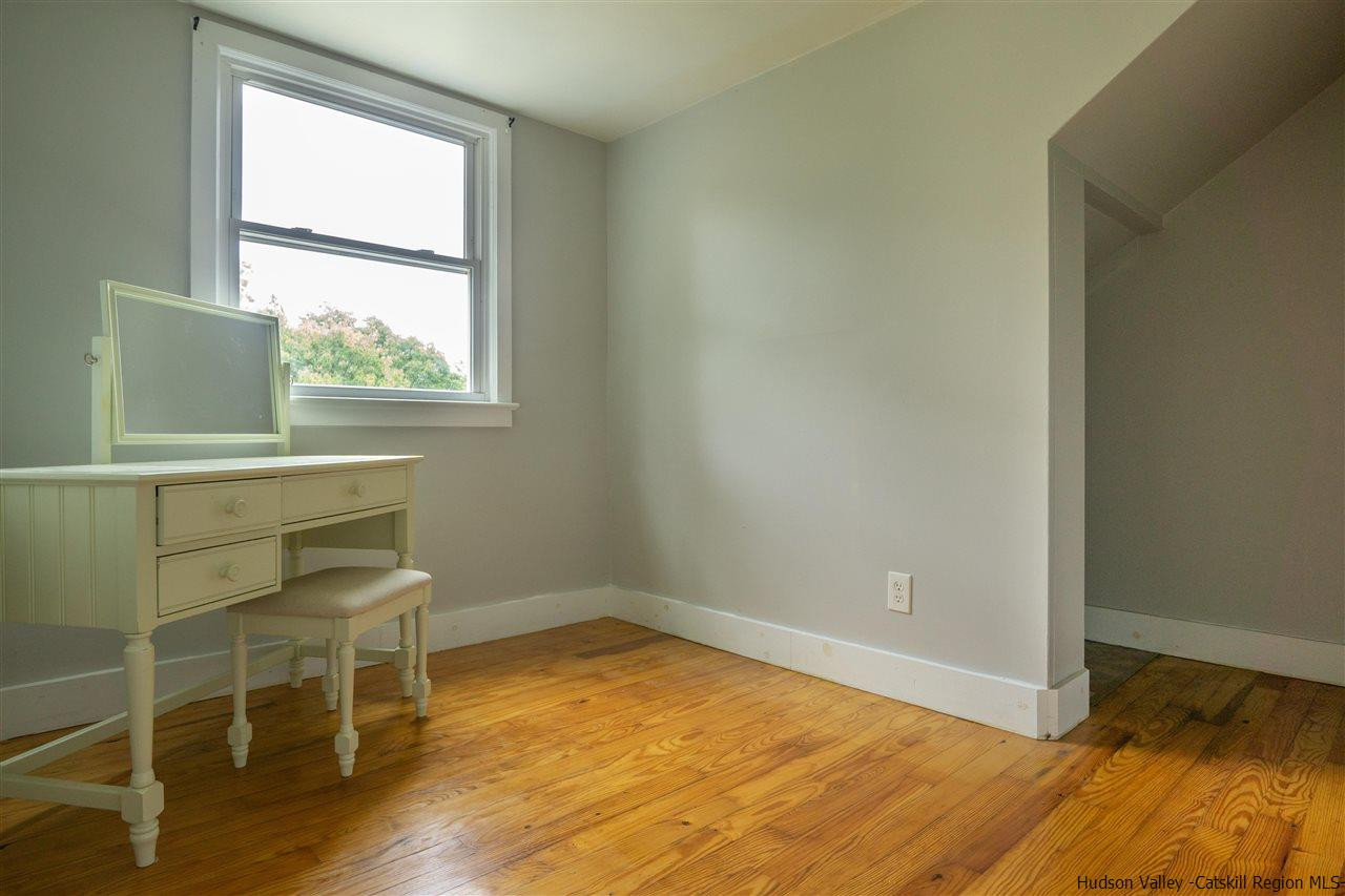 207 Marshall Road Salt Point, NY 12578 - Photo 17 of 22 a room with a window and a wooden floor