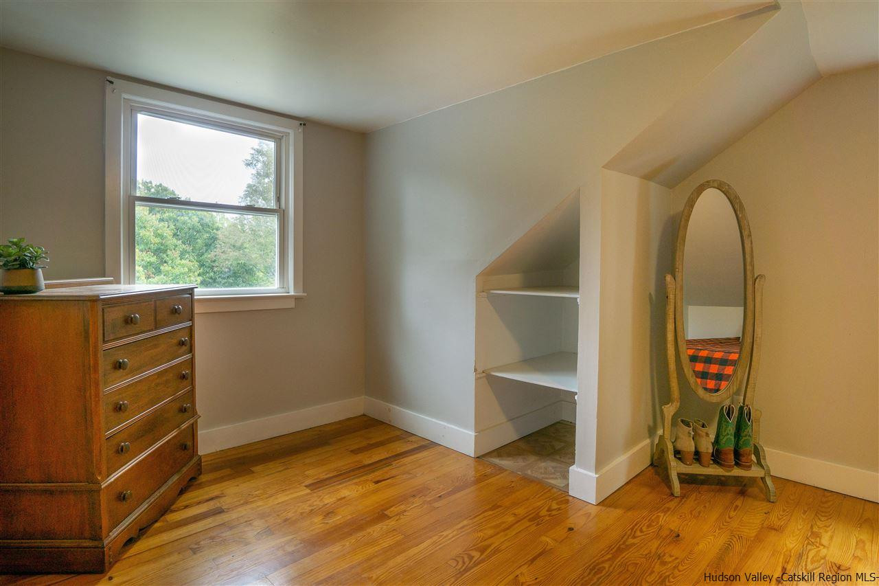 207 Marshall Road Salt Point, NY 12578 - Photo 18 of 22 a view of room with wooden floor and windows