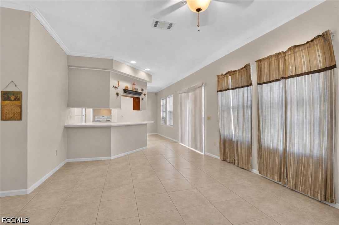 2808 34th Street Southwest Lehigh Acres, FL 33976 - Photo 4 of 14 a view of kitchen with cabinets