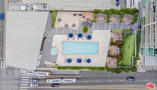 a lobby with furniture and floor to ceiling window