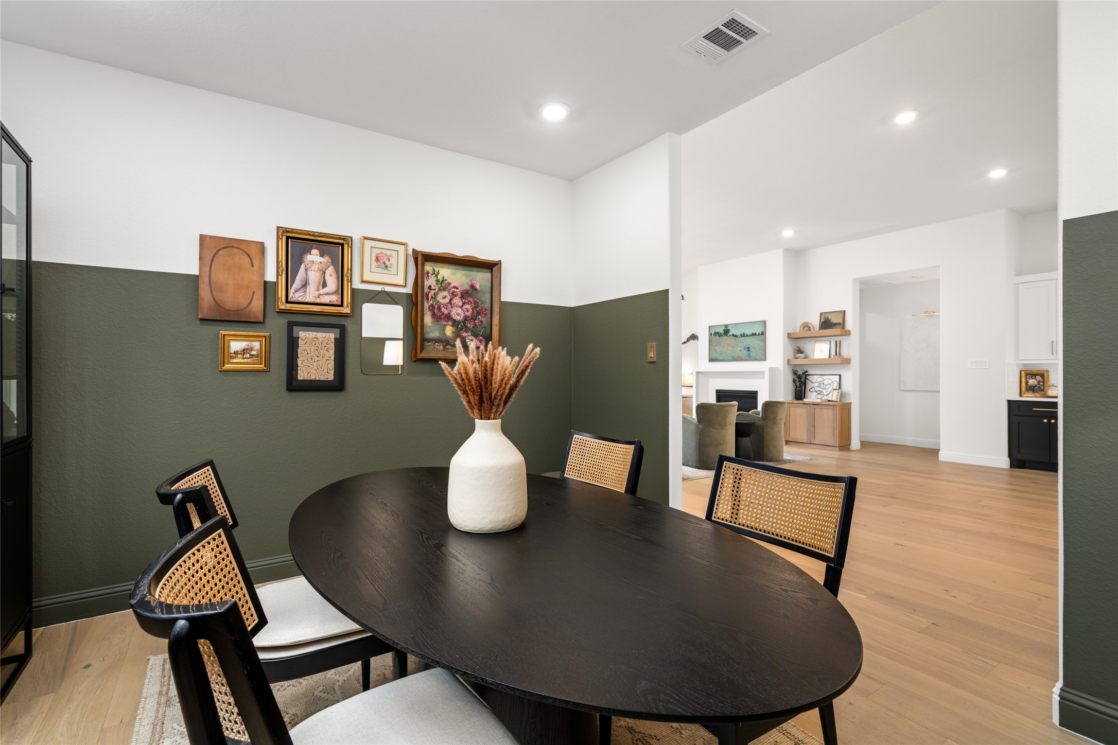 17461 Bayflower Conroe, TX 77385 - Photo 14 of 49 Secondary view from the dining room showcasing the open flow into the main living area and kitchen.