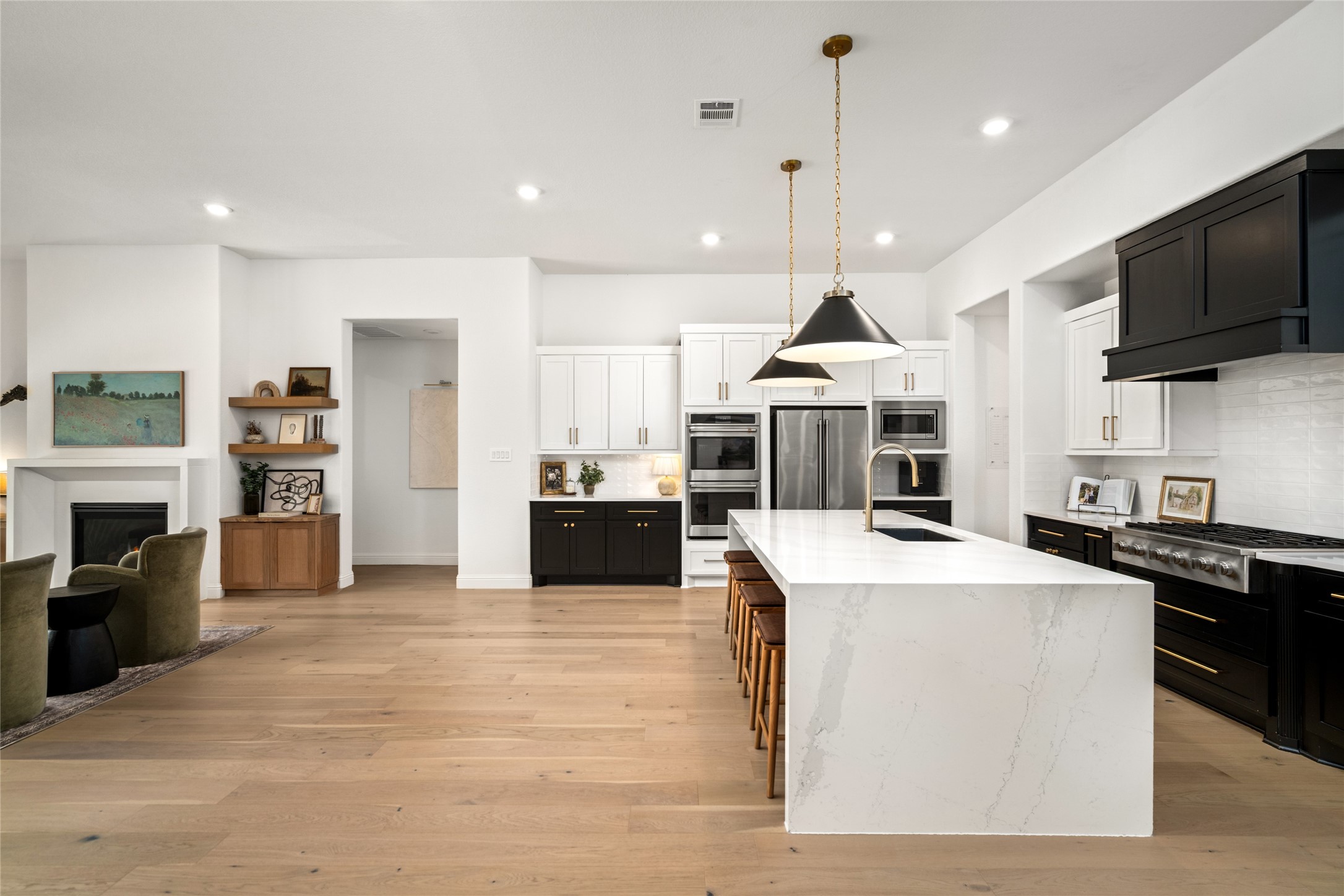 17461 Bayflower Conroe, TX 77385 - Photo 15 of 49 Enjoy entertaining with ample counterspace, an abundance of cabinetry, double gas ovens, and a butler's pantry or coffee bar.