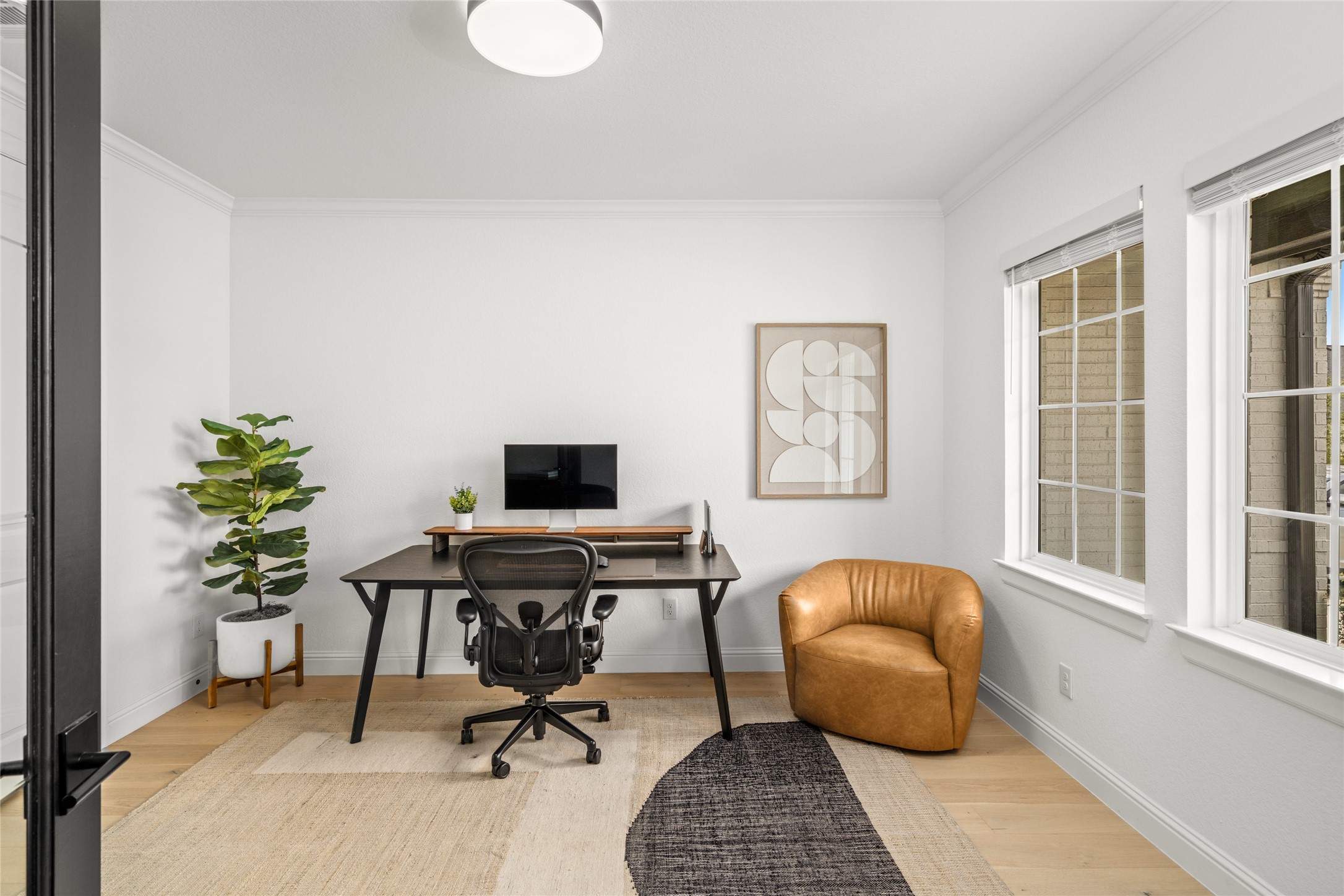 17461 Bayflower Conroe, TX 77385 - Photo 16 of 49 Bright home office offering a functional layout and comfortable workspace. Perfect for working from home or a quiet study area.